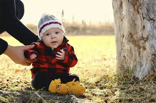 baby dressed for fall