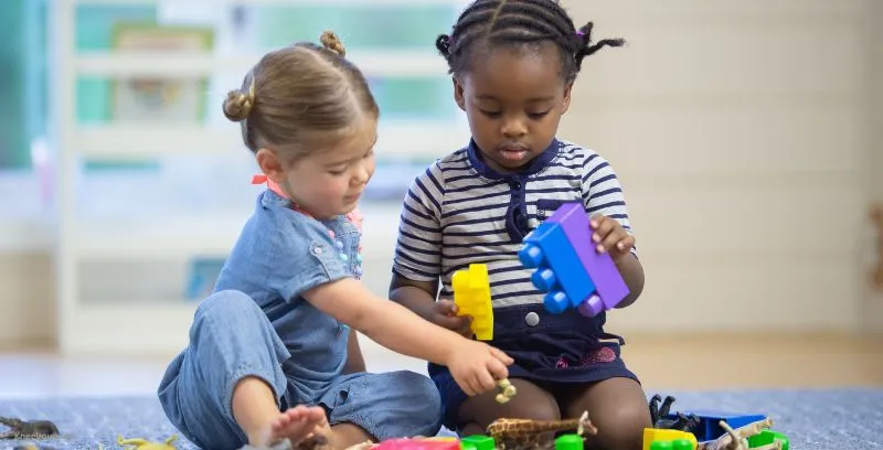girls with blocks