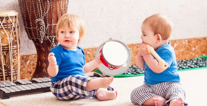 toddlers with drums